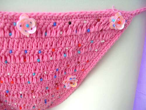 Sexy, pink needle knit art designed string bikini with flower like sequin decorimported by bali bali fashion factory supply company