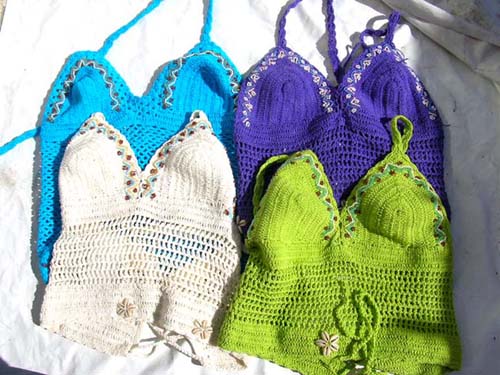 Ladies vacation clothing boutique store imports Sexy beaded knit wear halter top with seashell flower emblem from international b2b trader