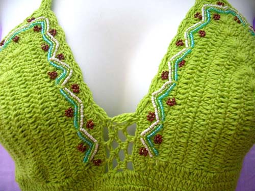 Ladies vacation clothing boutique store imports Sexy beaded knit wear halter top with seashell flower emblem from international b2b trader