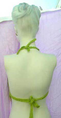 Party style halter top  with V shaped fit in front of belly from clothing import supply wholesale exchange company