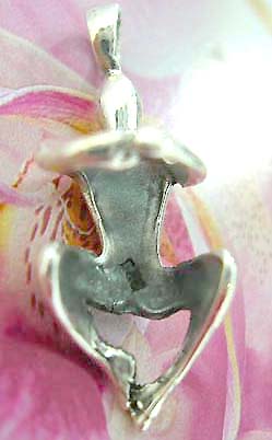 925. Thailand made solid sterling silver charm pendant with man in embrassing position design