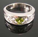 Online cz jewelry wholesale supply cz ring with lime green cz lie in center paired with two clear cz stones