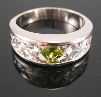 Online cz jewelry wholesale supply cz ring with lime green cz lie in center paired with two clear cz stones