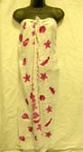 Importer distribution manufactures pink seashell print on white balinese fashion wrap