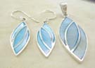 Matching jewelry silver set, pearl, 925 stamped sterling silver earrings and pendant in olive shape with blue mother of pearl 