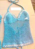 Fish-net aquarium handicraft medium length crochet top with embroidery flower pattern, tie at top and multi tie at back
