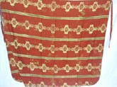 Bright brown ethic stripes wrap around long skirt